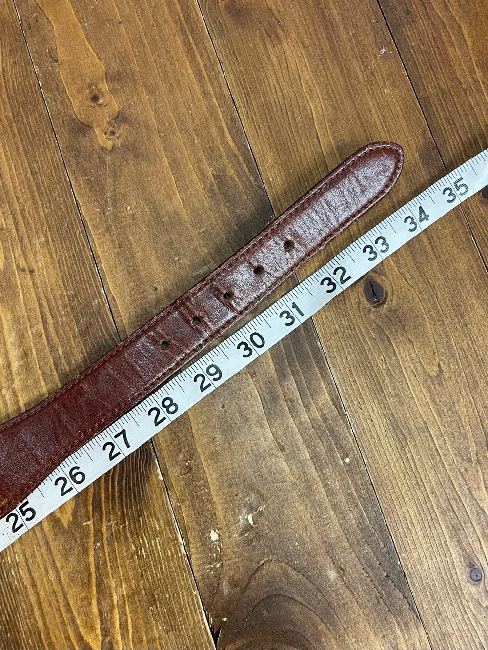 Fossil size medium leather and metal belt